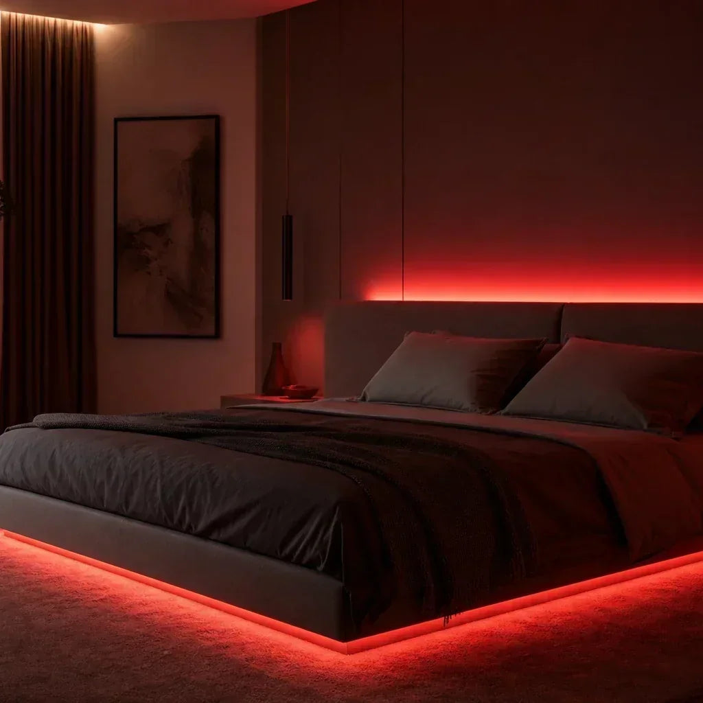 Bedroom illuminated by dim red LED accent lights before sleep
