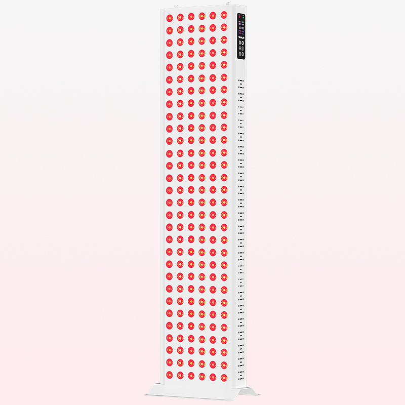 Tall white red light therapy panel with multiple LED bulbs and digital control display
