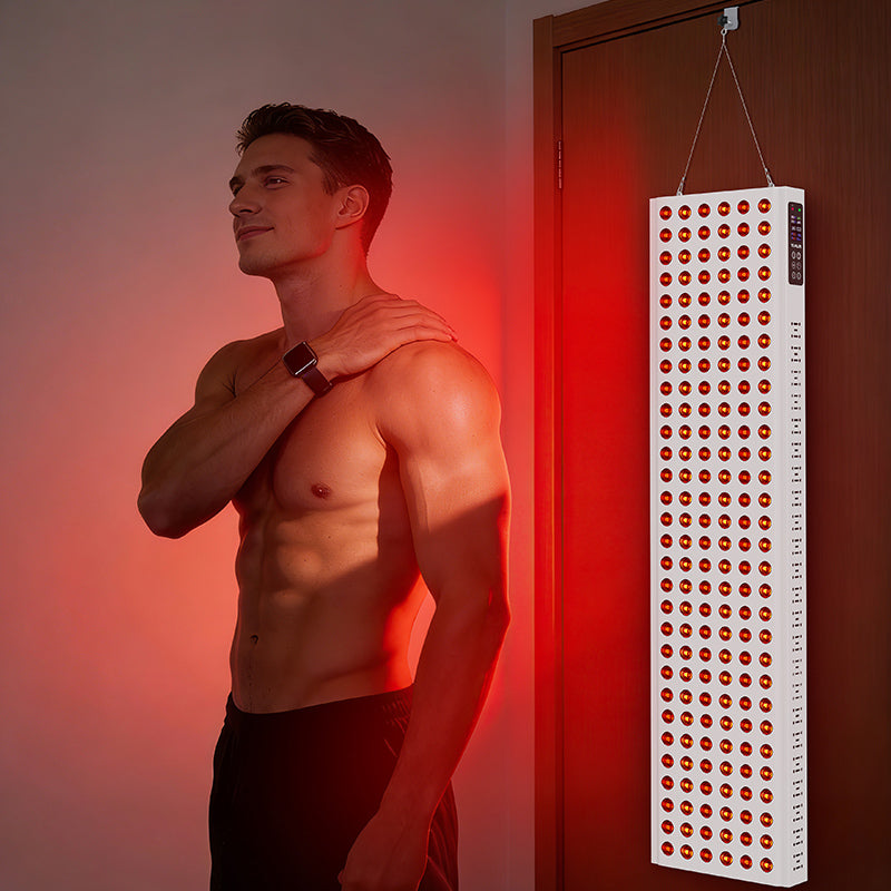 Male user enjoying red light therapy for muscle recovery after a workout in a locker room