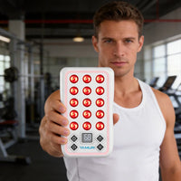 Man at a gym holding the illuminated YA20-2W7 portable red light therapy panel with 15 LED lenses