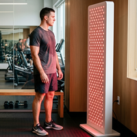 man using red light therapy after workout for muscle recovery