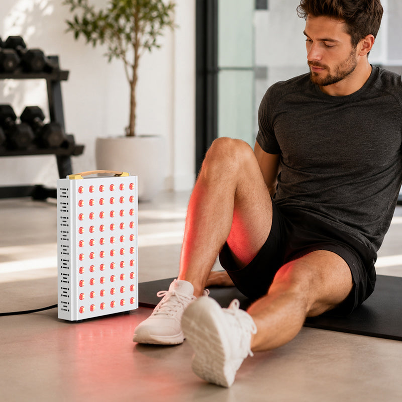 Man using the illuminated YA60-2W7 panel on his knee after exercise in a home gym