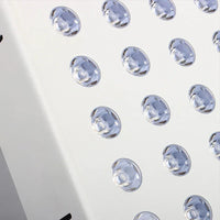 Close-up of precision LED lenses on a full-body red and near-infrared light therapy panel